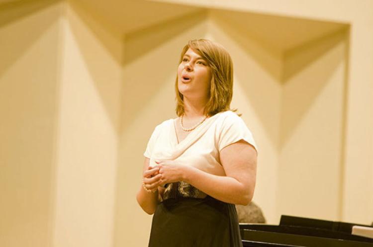 singer on stage during schmidt competition