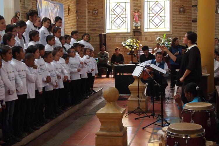 corie brown working with choral students in colombia