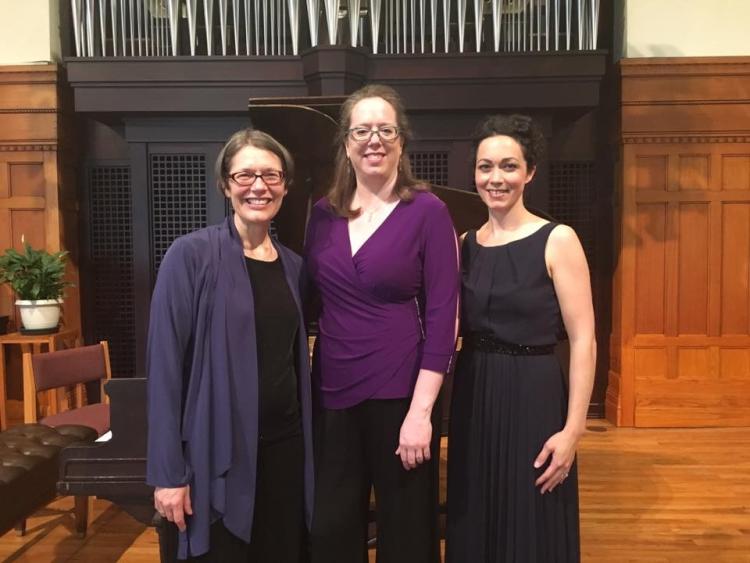 erika eckert, margaret mcdonald, abigail nims posing by organ