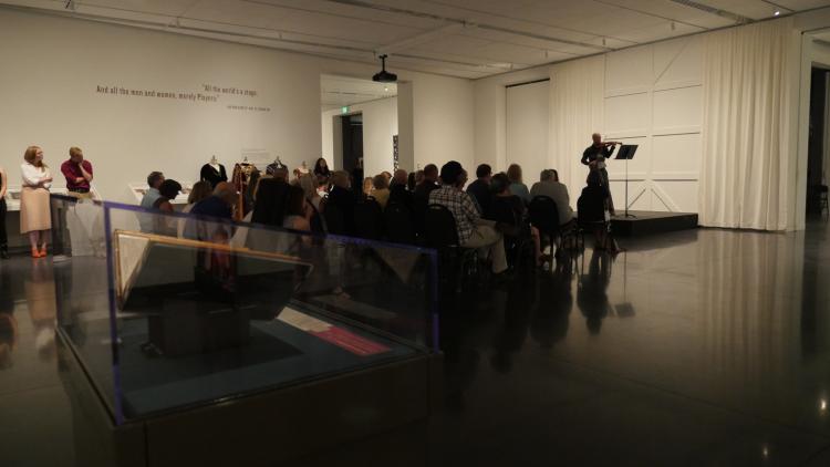 student performing at shakespeare exhibit