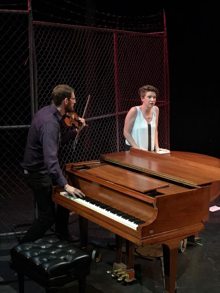 Kristen Gornstein and husband on stage, credit Heartbeat Opera