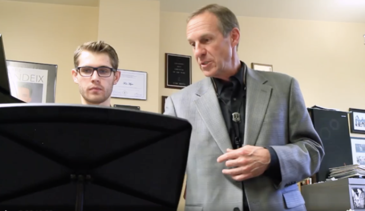Tom Myer working with student