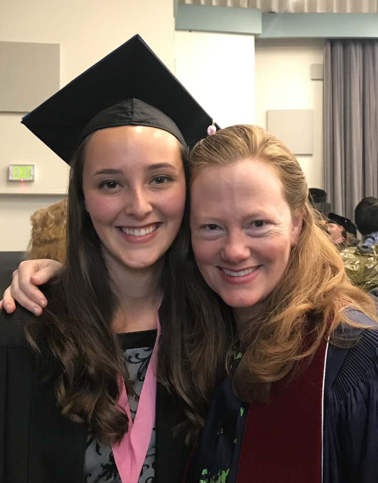 Fischer with Professor of Flue Christina Jennings at graduation.