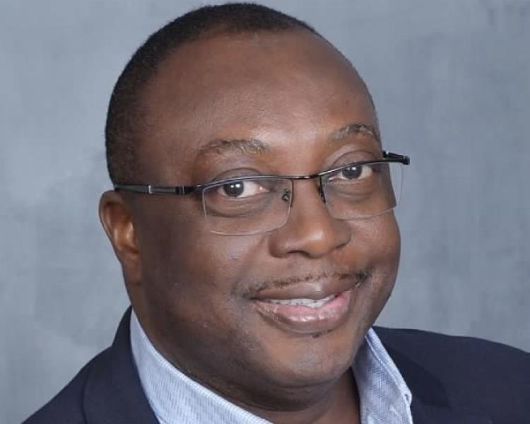 Associate professor of ethnomusicology + interim director of the American Music Research Center Austin Okigbo