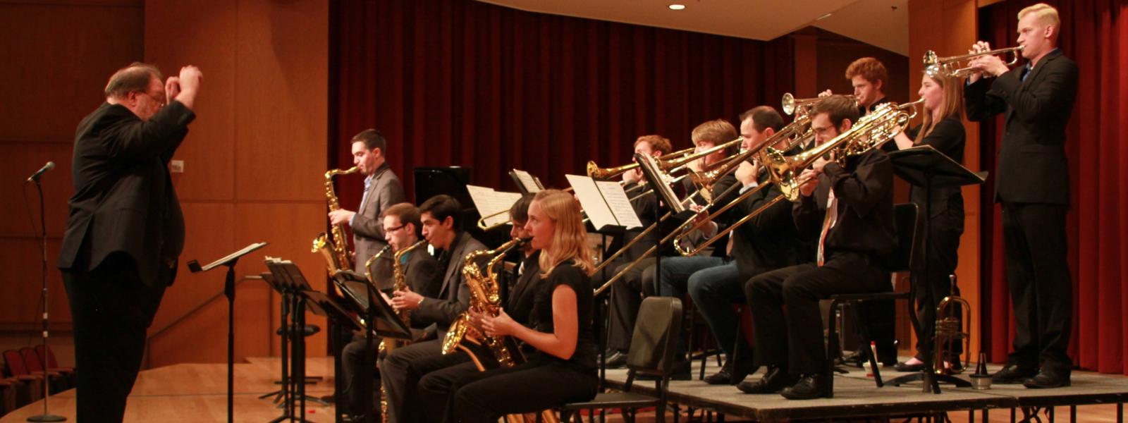 Music education student conducting band