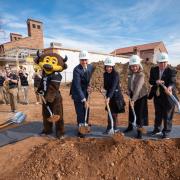 Groundbreaking group with shovels