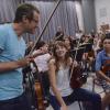 Cleveland Orchestra member listening to student