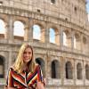 Allison Cawthon smiling in front of the Colosseum