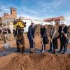 Groundbreaking group with shovels