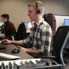 grad working at desk