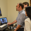 students and professor doing research