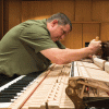 ted tuning a piano