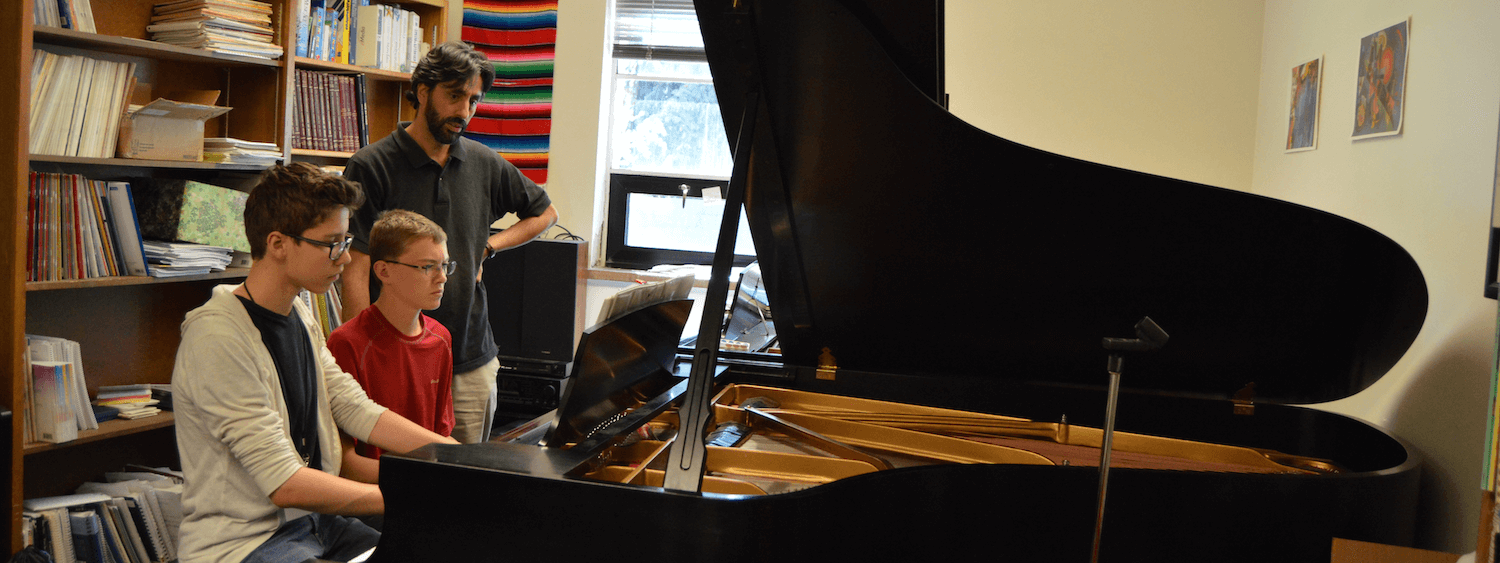 piano students and teacher