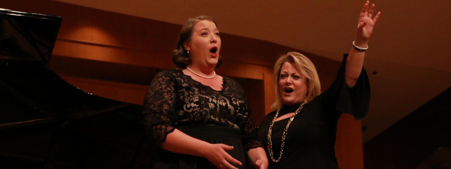 Voice student working with guest artist in master class