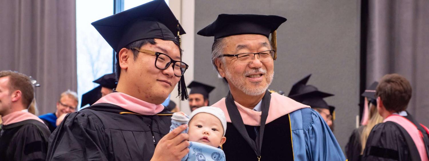 professor and student with baby