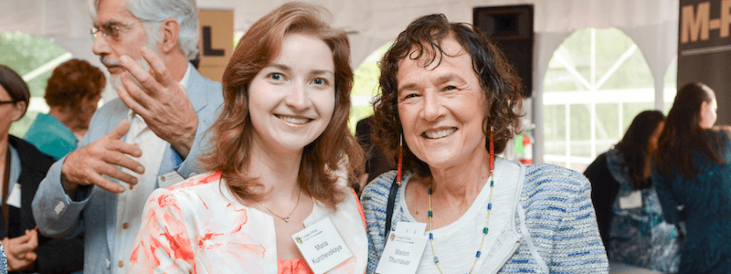 Two women smiling at College of Music donor event
