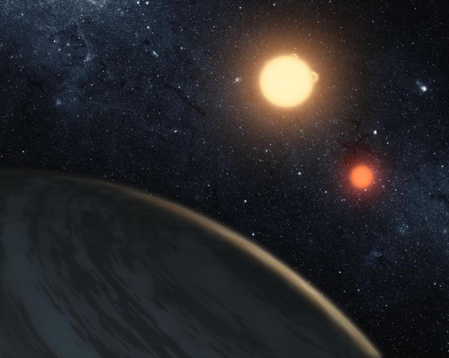 Illustration from NASA's Kepler mission discovers a world orbiting two stars. NASA JPL-Caltech