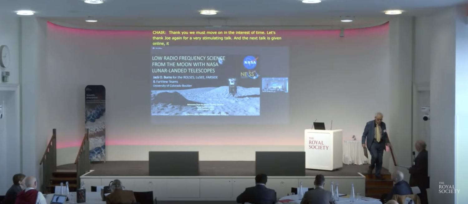Screen shot from conference room with Jack Burns's slide on the screen