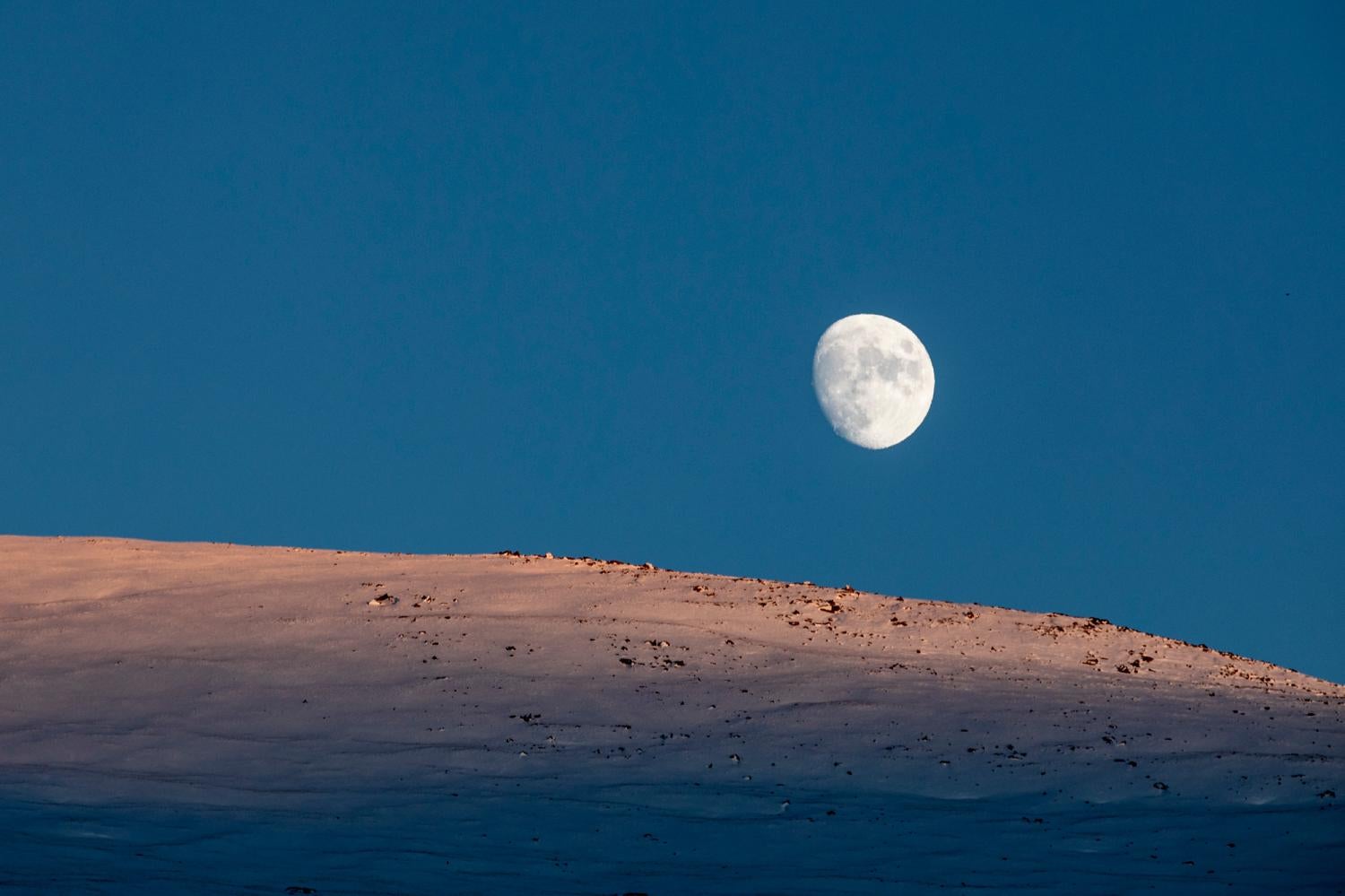 The moon rises over the Continental Divide seen from near Berthoud Pass, Tuesday evening, Oct. 27, 2020. Credit CPR News Hart Van Denburg