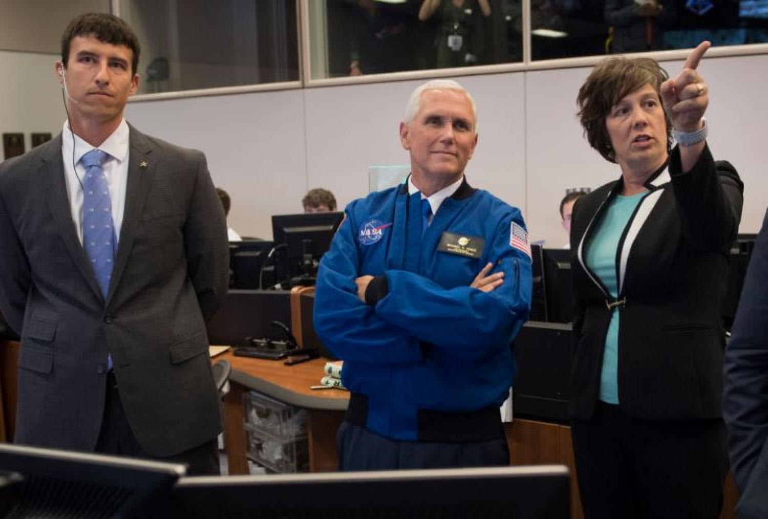 Vice President Mike Pence, center in Mission Control Houston, will oversee all space decisions made by the Trump administration.