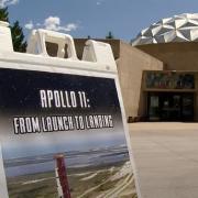 Fiske Planetarium with Apollo 11 poster in foreground