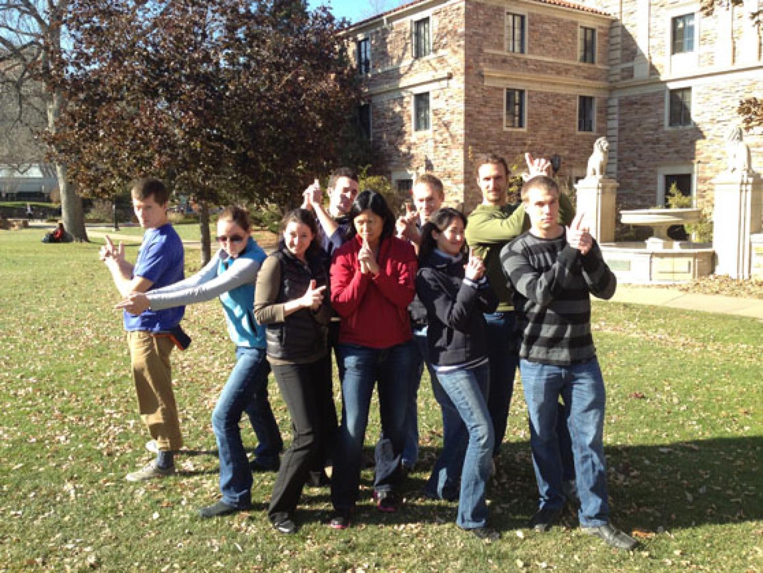 our lab group poses as Charlie's Angels out on the lawn