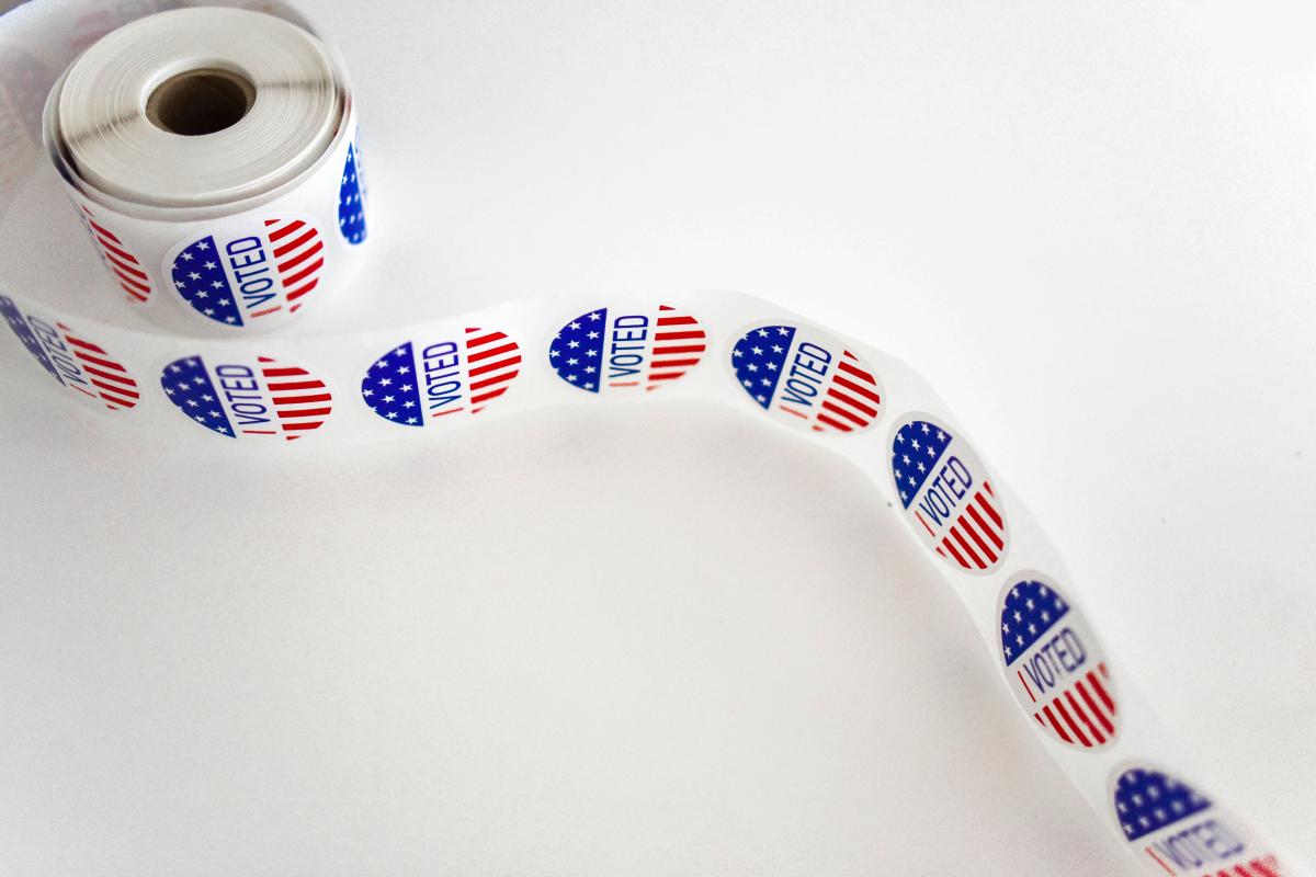 A roll of "I voted" stickers with a red, white and blue design.