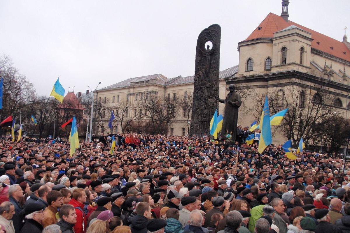 Protestors waving European Union flags