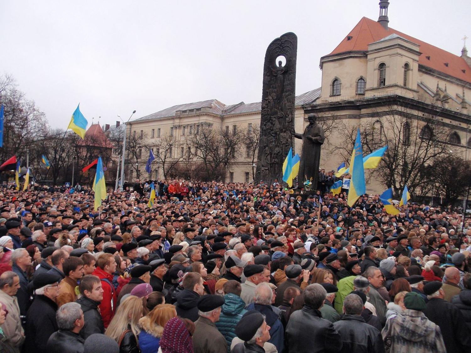 Protestors waving European Union flags