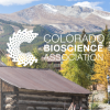 Colorado Bioscience Association Logo on a background of the Rocky Mountains