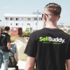 Workers in SellBuddy T-shirts