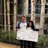 kartwheel holding big check
