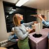 HUG Solutions team members Claire Meyer and Evan Kirk demonstrate how thermal testing for the PortaVax device is set up