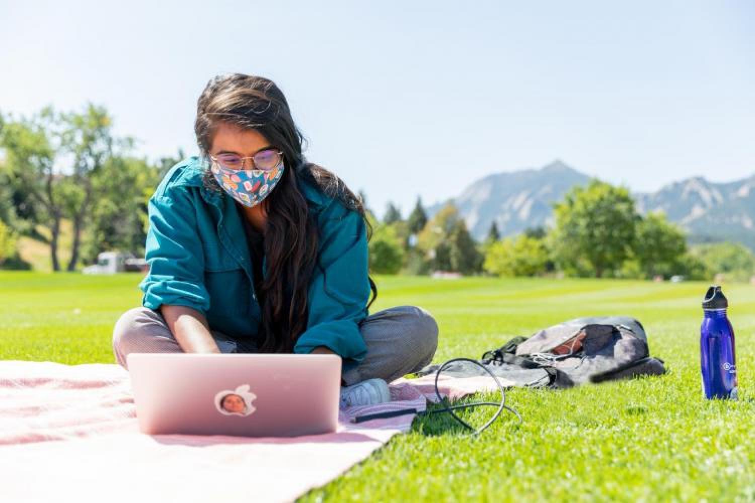 Student sitting outside