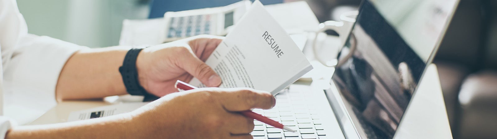 Person holding a resume