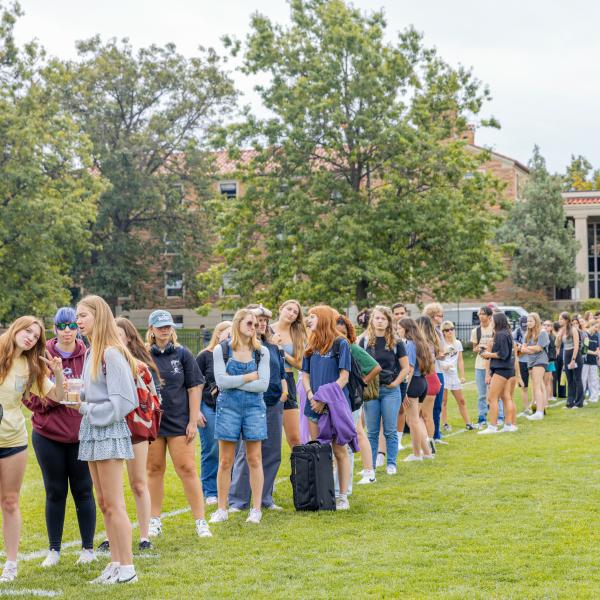 students in line for homecoming events