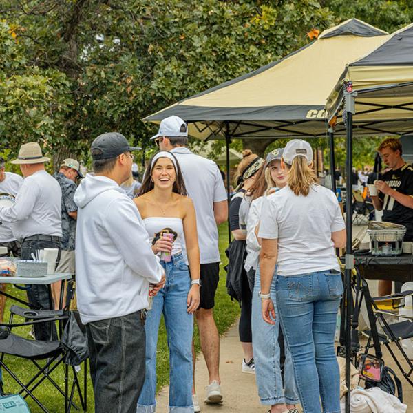 students and fans tailgating