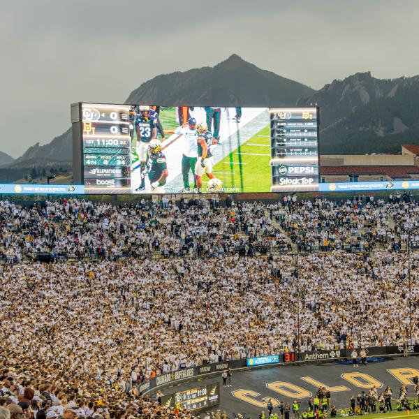 student section and scoreboard at Folsom Field