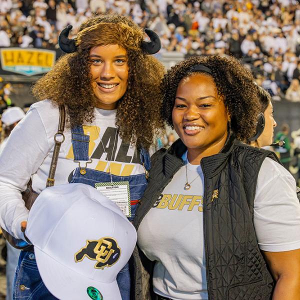 Dr. Mull and student fan
