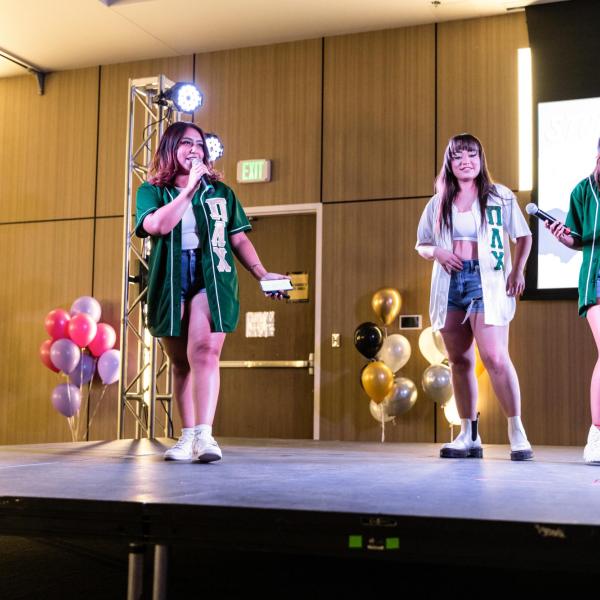 Students performing on stage