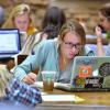 Students studying at tables