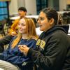 female students sitting at table