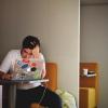 stressed student at laptop