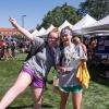 students posting for camera at club fair