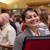 student smiling at camera at a career fair