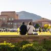 Parents sitting on campus