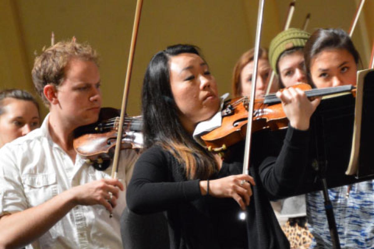 Students playing instruments