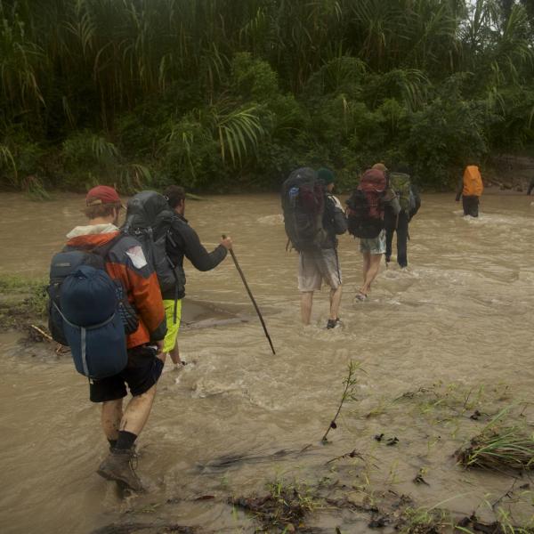 Walking through river