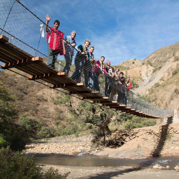 Builders standing on bridge