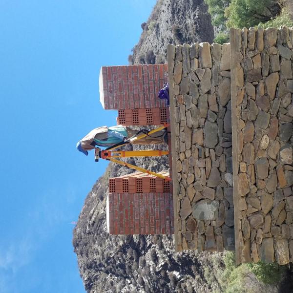 Member standing on tower